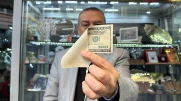 Bir tarafı olmayan hatalı basım 100 doları satışa çıkardı