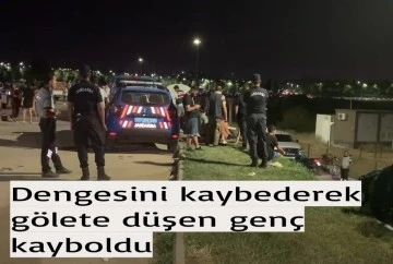 Dengesini kaybederek gölete düşen genç kayboldu