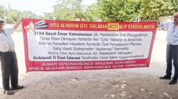 Köy muhtarından arsa alanlara pankartlı uyarı