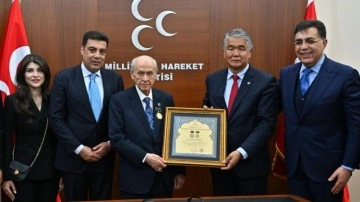 MHP Genel Başkanı Bahçeli'ye "Ahmed Cevad Onur Madalyası" verildi