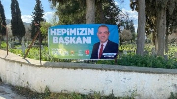 Ölülerden mi oy alacaksınız diyerek isyan ettiler. Mezarlığa asılan seçim afişine büyük tepki